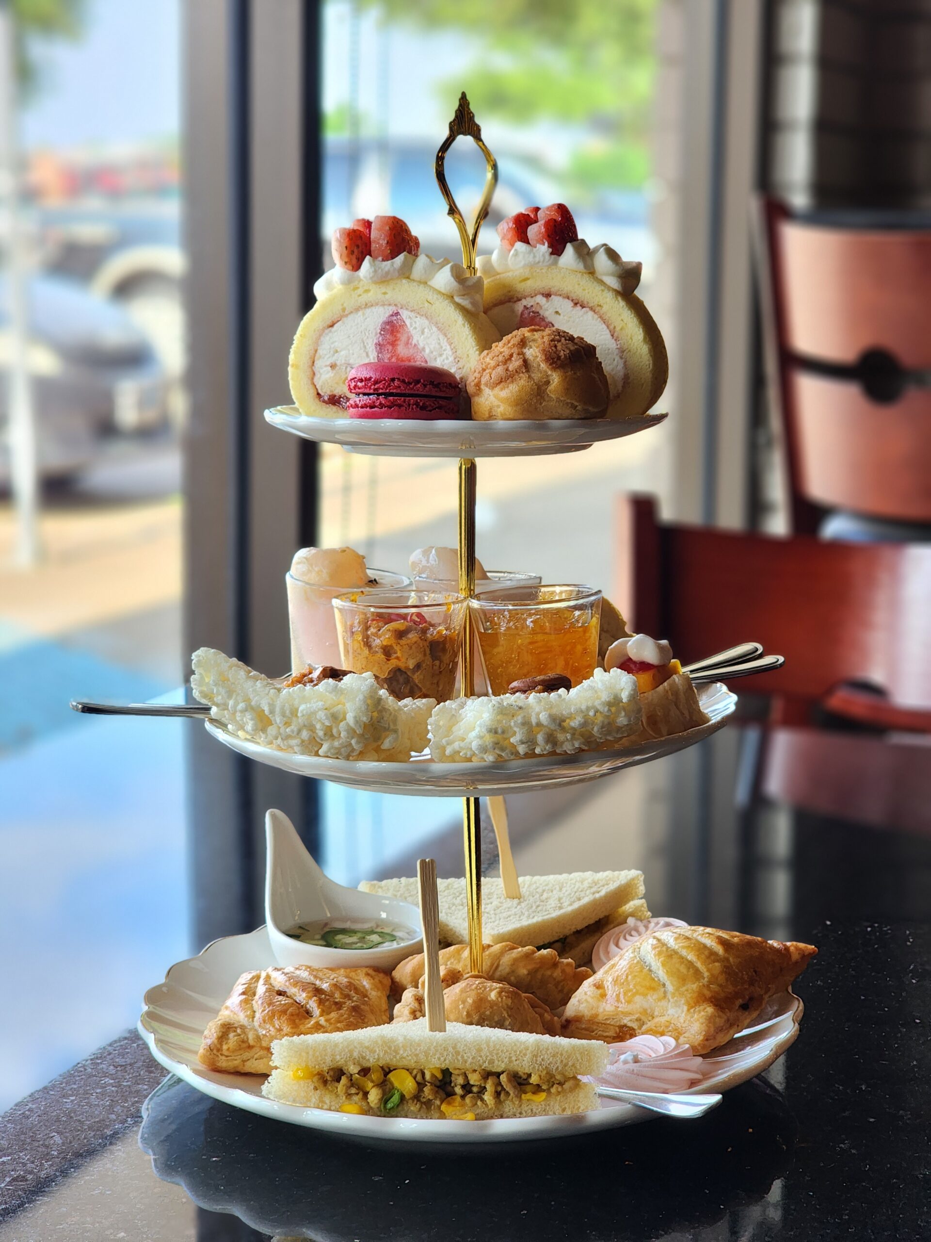 Thai Afternoon Tea three-tier service by the window