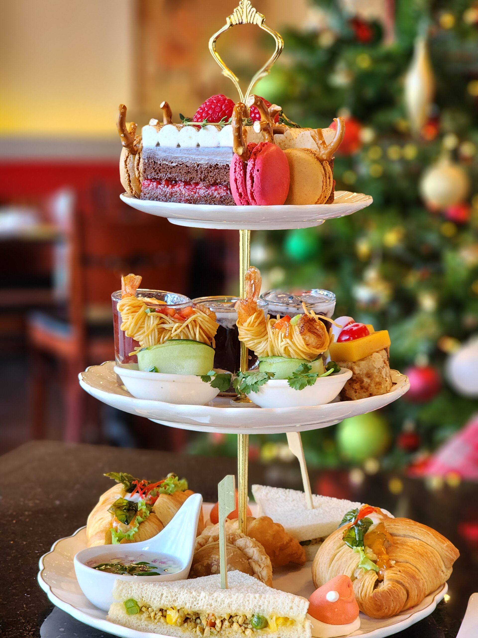 Thai Afternoon Tea cake and macaron closeup